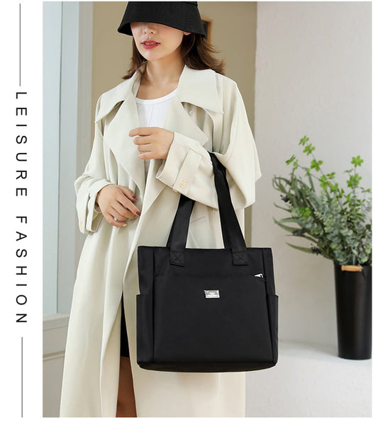 💼2025 Nagy kapacitású, vízálló, több zsebbel ellátott nylon válltáska