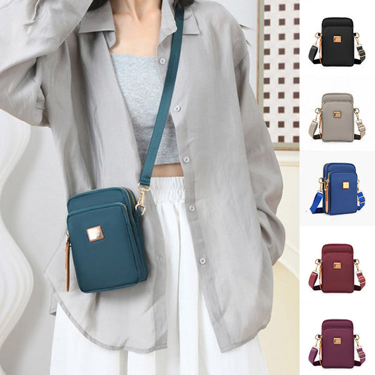 👛✨ Stílusos háromrétegű crossbody táska